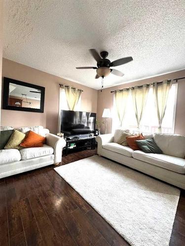 31 Martin Crossing Park Ne, Calgary, AB - Indoor Photo Showing Living Room