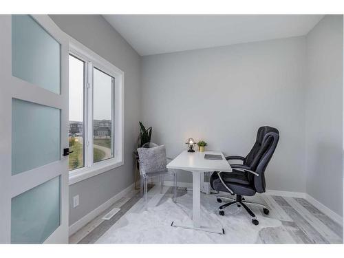 523 Kingsmere Way Se, Airdrie, AB - Indoor Photo Showing Office