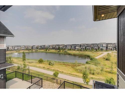 523 Kingsmere Way Se, Airdrie, AB - Outdoor With Body Of Water With View