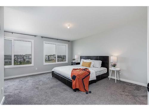 523 Kingsmere Way Se, Airdrie, AB - Indoor Photo Showing Bedroom