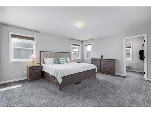 523 Kingsmere Way Se, Airdrie, AB - Indoor Photo Showing Bedroom