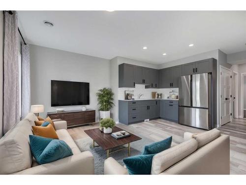 523 Kingsmere Way Se, Airdrie, AB - Indoor Photo Showing Living Room