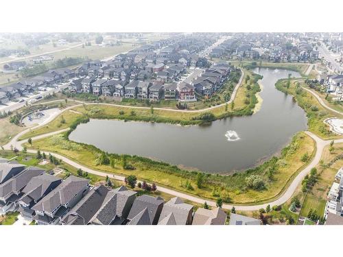 523 Kingsmere Way Se, Airdrie, AB - Outdoor With Body Of Water With View