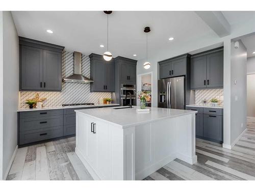 523 Kingsmere Way Se, Airdrie, AB - Indoor Photo Showing Kitchen With Upgraded Kitchen