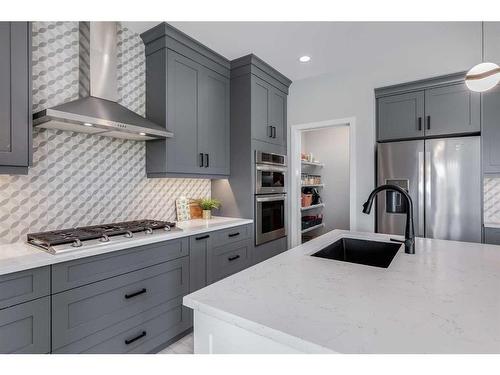 523 Kingsmere Way Se, Airdrie, AB - Indoor Photo Showing Kitchen With Upgraded Kitchen