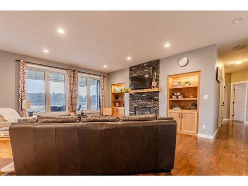 56210 Rr24 Range, Rural Lac Ste. Anne County, AB - Indoor Photo Showing Living Room With Fireplace