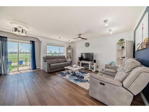 315 Taracove Estate Drive Ne, Calgary, AB - Indoor Photo Showing Living Room