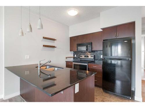 1505-8880 Horton Road Sw, Calgary, AB - Indoor Photo Showing Kitchen