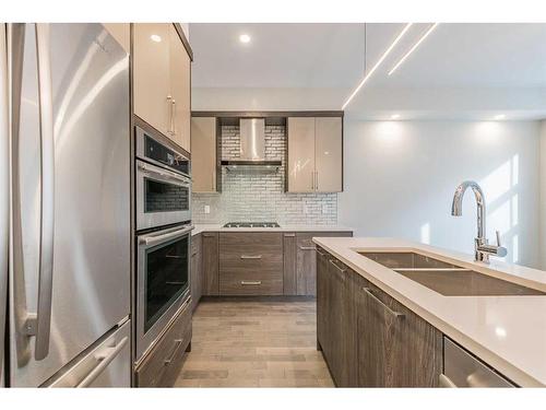 1539 33 Avenue Sw, Calgary, AB - Indoor Photo Showing Kitchen With Stainless Steel Kitchen With Double Sink With Upgraded Kitchen