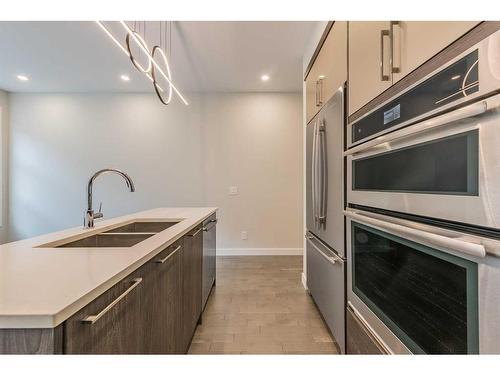 1539 33 Avenue Sw, Calgary, AB - Indoor Photo Showing Kitchen With Stainless Steel Kitchen With Double Sink