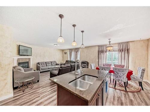 1351 Kings Heights Road Se, Airdrie, AB - Indoor Photo Showing Kitchen With Double Sink