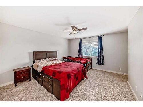 1351 Kings Heights Road Se, Airdrie, AB - Indoor Photo Showing Bedroom