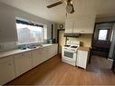 274034A Range Road 243, Rural Wheatland County, AB  - Indoor Photo Showing Kitchen With Double Sink 