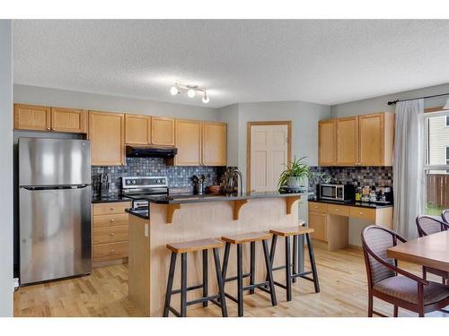 52 Panatella Gate Nw, Calgary, AB - Indoor Photo Showing Kitchen With Stainless Steel Kitchen