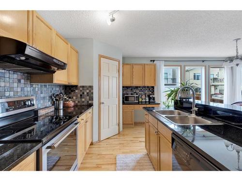 52 Panatella Gate Nw, Calgary, AB - Indoor Photo Showing Kitchen With Stainless Steel Kitchen With Double Sink