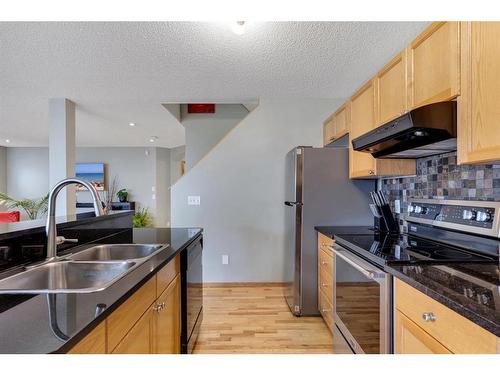 52 Panatella Gate Nw, Calgary, AB - Indoor Photo Showing Kitchen With Stainless Steel Kitchen With Double Sink