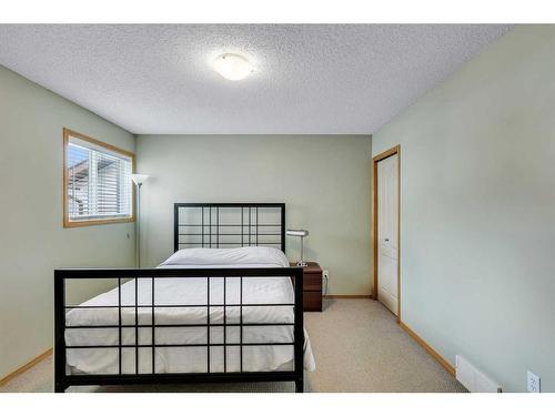 52 Panatella Gate Nw, Calgary, AB - Indoor Photo Showing Bedroom