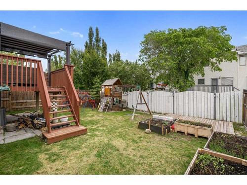 358 Hawkstone Drive Nw, Calgary, AB - Outdoor With Backyard