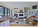 414 Wildwood Drive Sw, Calgary, AB  - Indoor Photo Showing Living Room With Fireplace 