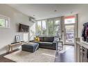 101-1808 27 Avenue Sw, Calgary, AB  - Indoor Photo Showing Living Room 