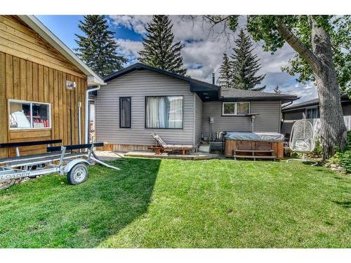 105 Cochrane Crescent, Cochrane, AB - Outdoor With Deck Patio Veranda