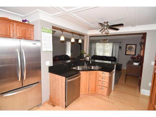 105 Cochrane Crescent, Cochrane, AB - Indoor Photo Showing Kitchen With Double Sink