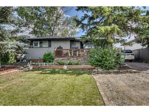 105 Cochrane Crescent, Cochrane, AB - Outdoor With Deck Patio Veranda