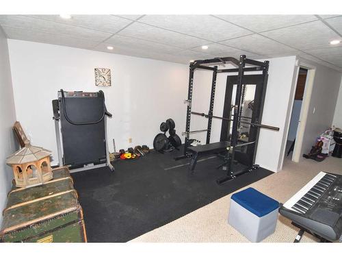 105 Cochrane Crescent, Cochrane, AB - Indoor Photo Showing Gym Room