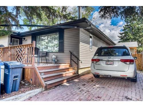 105 Cochrane Crescent, Cochrane, AB - Outdoor With Exterior