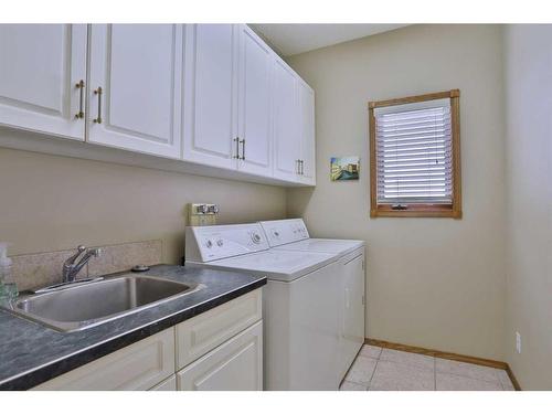 139 Hamptons Terrace Nw, Calgary, AB - Indoor Photo Showing Laundry Room