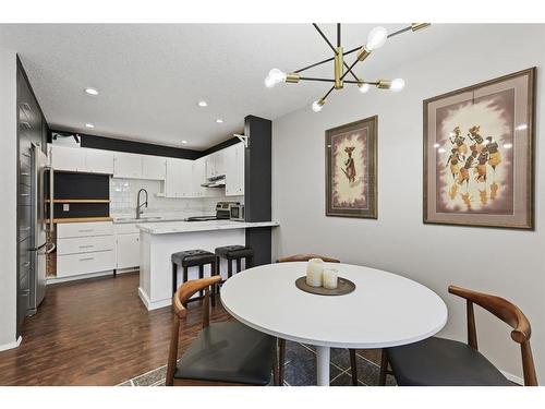 4-2015 2 Avenue Nw, Calgary, AB - Indoor Photo Showing Dining Room