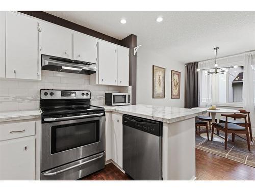 4-2015 2 Avenue Nw, Calgary, AB - Indoor Photo Showing Kitchen With Stainless Steel Kitchen