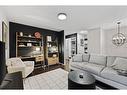 4-2015 2 Avenue Nw, Calgary, AB  - Indoor Photo Showing Living Room 