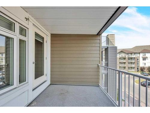 2302-6118 80 Avenue Ne, Calgary, AB - Outdoor With Balcony With Exterior