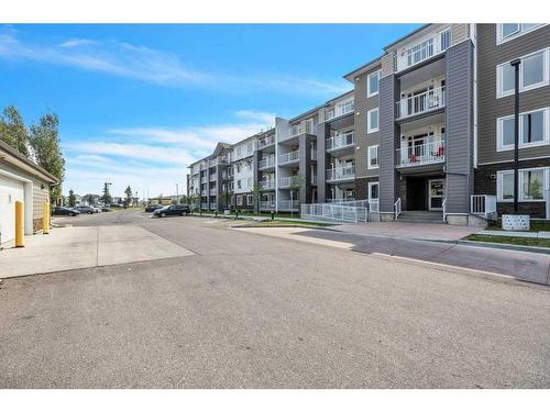 2302-6118 80 Avenue Ne, Calgary, AB - Outdoor With Balcony With Facade