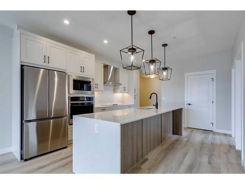 2109-55 Lucas Way Nw, Calgary, AB - Indoor Photo Showing Kitchen With Stainless Steel Kitchen With Upgraded Kitchen