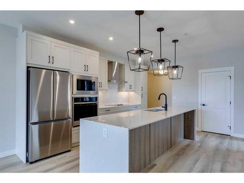 2109-55 Lucas Way Nw, Calgary, AB - Indoor Photo Showing Kitchen With Stainless Steel Kitchen With Upgraded Kitchen