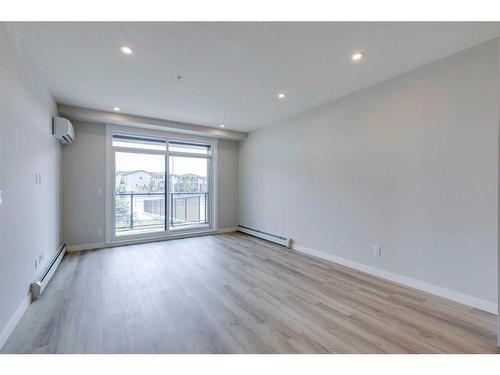 2109-55 Lucas Way Nw, Calgary, AB - Indoor Photo Showing Other Room