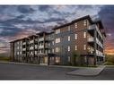 2109-55 Lucas Way Nw, Calgary, AB  - Outdoor With Facade 