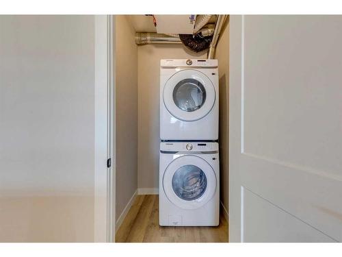 2109-55 Lucas Way Nw, Calgary, AB - Indoor Photo Showing Laundry Room