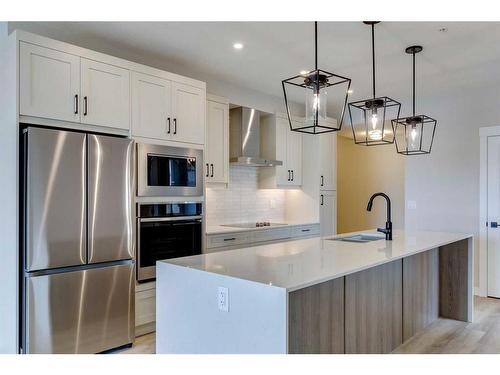 2109-55 Lucas Way Nw, Calgary, AB - Indoor Photo Showing Kitchen With Stainless Steel Kitchen With Upgraded Kitchen