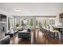 15 Brightoncrest Cove Se, Calgary, AB  - Indoor Photo Showing Living Room With Fireplace 