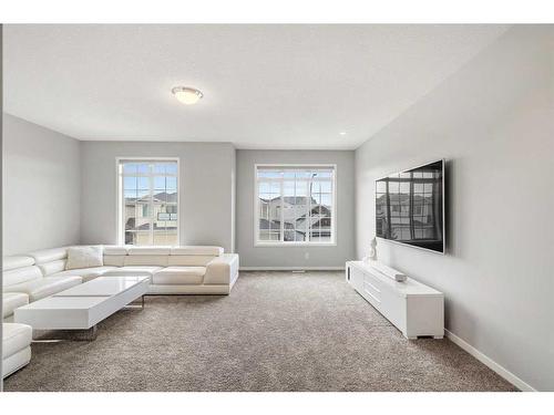 15 Brightoncrest Cove Se, Calgary, AB - Indoor Photo Showing Living Room