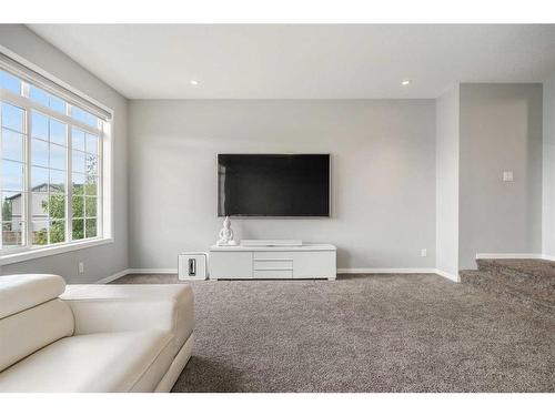 15 Brightoncrest Cove Se, Calgary, AB - Indoor Photo Showing Living Room