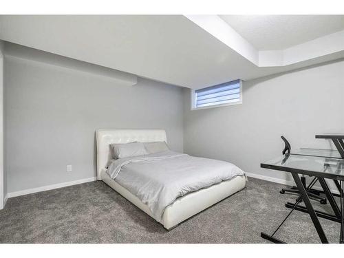 15 Brightoncrest Cove Se, Calgary, AB - Indoor Photo Showing Bedroom