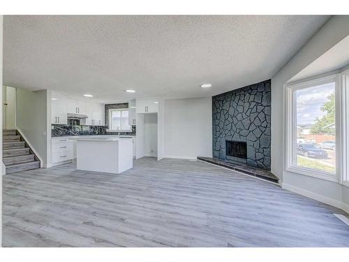 12 Castleglen Crescent Ne, Calgary, AB - Indoor With Fireplace