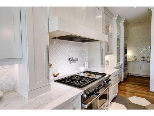 92 Hawk'S Landing Drive, Priddis Greens, AB - Indoor Photo Showing Kitchen With Upgraded Kitchen