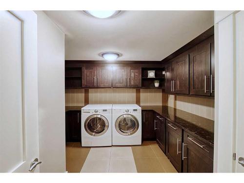 92 Hawk'S Landing Drive, Priddis Greens, AB - Indoor Photo Showing Laundry Room