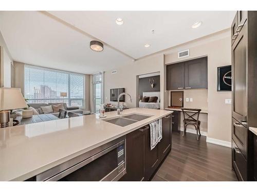 1528-222 Riverfront Avenue Sw, Calgary, AB - Indoor Photo Showing Kitchen With Stainless Steel Kitchen With Double Sink