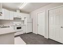 561-100 Jordan Parkway, Red Deer, AB  - Indoor Photo Showing Kitchen With Double Sink 